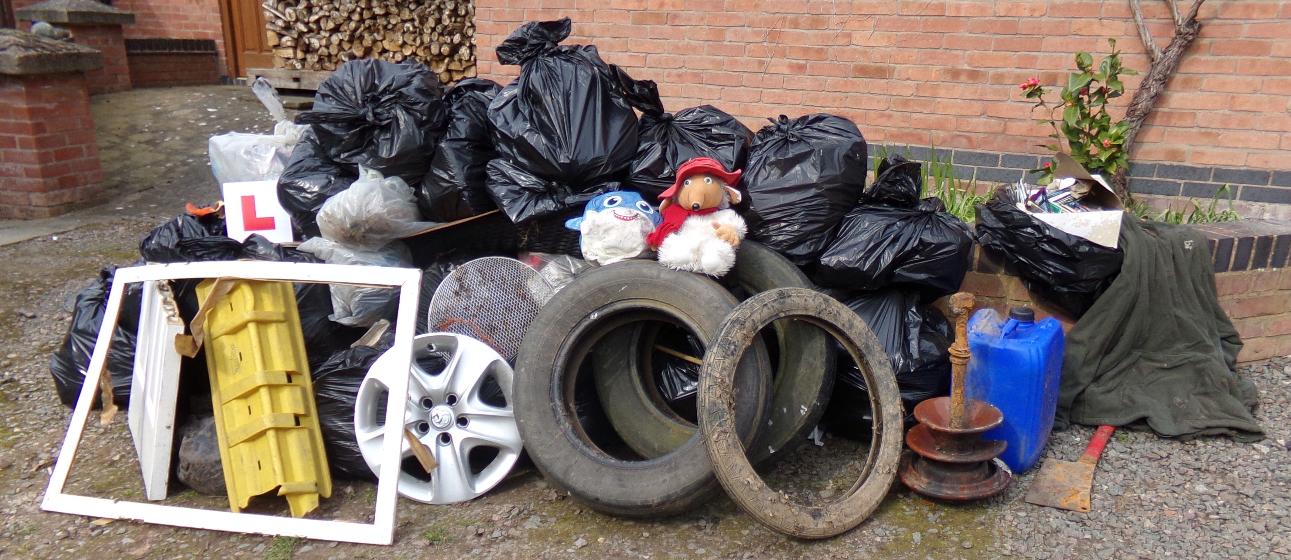 Orinoco Womble on pile of rubbish collected